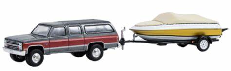 1987 Chevrolet Suburban with Boat Trailer and Boat
